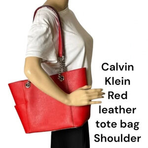 Calvin Klein tote bag,women large. Red Leather tote  silver chains, side pockets